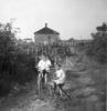 Kenny Doucette and Bernie Francis on tricycles, Gallagher Street.(Mary Jane Doucette Collection)