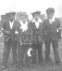 Stephan 'Dinglo' Christmas, Joe. B. Marshall, Bernie Christmas and Vincent Paul. First Communion 1948.(Mary Jane Doucette Collection)